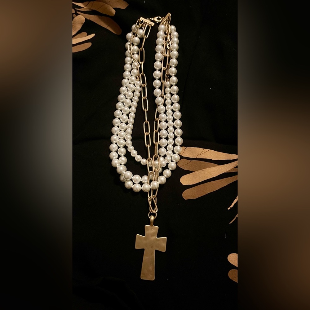 Fashion pearl necklace and cross Three strands. Cross 24” and pearls 18”
